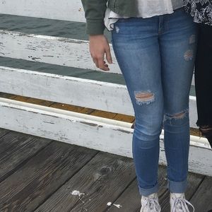 Light wash distressed skinny jeans